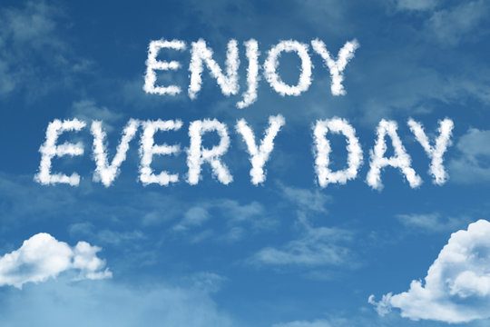 Enjoy Every Day cloud word with a blue sky