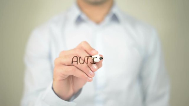 Autism, man writing on transparent screen