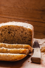 Sliced whole wheat bread on cutting board