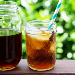Iced coffee in mason jars outdoors