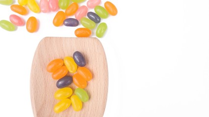 candy isolated and spoon on white background with space for word : this has clipping path