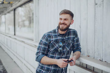 Fototapeta premium Man with gadget and glasses