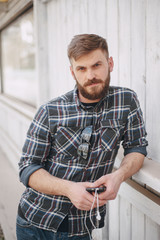 Man with gadget and glasses