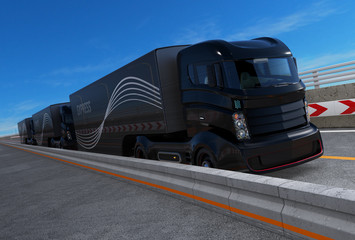 Fleet of autonomous hybrid trucks driving on highway. 3D rendering image.