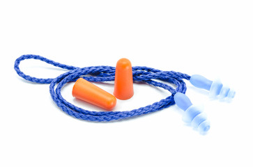 Blue and orange earplugs with a string on white background.