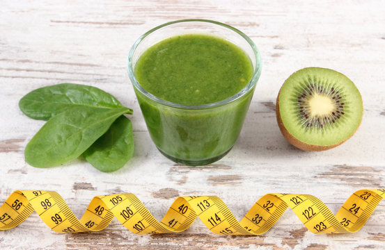 Ingredients, fresh cocktail from spinach and centimeter on wooden background, healthy nutrition and slimming