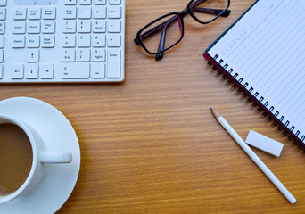 office table with cup of coffee