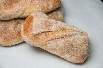  Ciabatta loaves of bread  background
