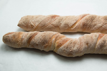  Ciabatta loaves of bread  background