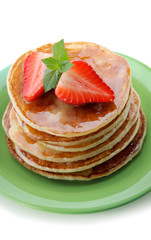 Breakfast.Pancakes with  strawberry and honey.