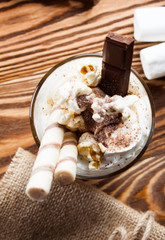 Latte coffee in cup with spices.