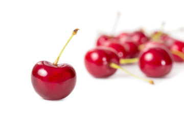 Naklejka na ściany i meble Ripe cherries - isolated on white background