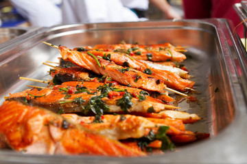 Broiled salmon fish sticks, fried fish. Street food