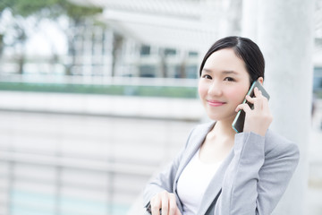 business woman speak smart phone