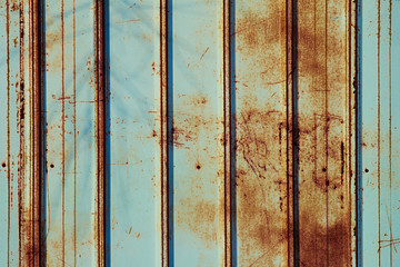 Rusty fence mint color. Mint color background. Rusty metal panel.
