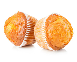 Delicious muffins close-up isolated on white background.