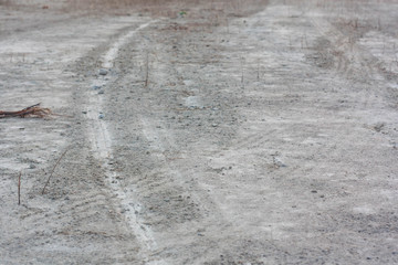 Traces of the machine on the ground, selective focus.