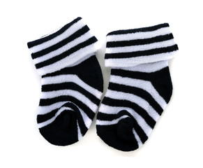 Pair of child's striped socks on a white background