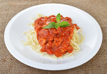spaghetti pasta with tomato sauce.