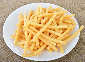 Sweet potato chips on white plate