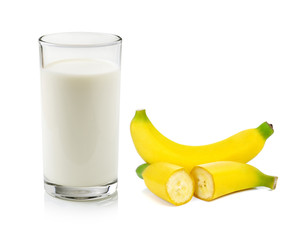 Glass of milk and banana over white background
