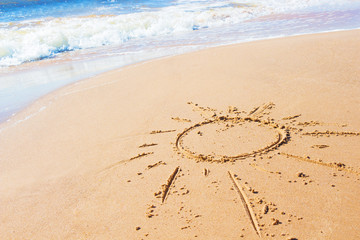 Drawing of sun on the beach and sea