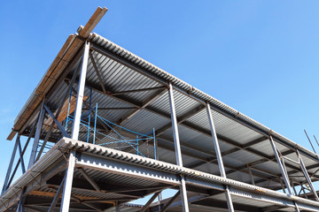 Naklejka premium Modern industrial building is under construction