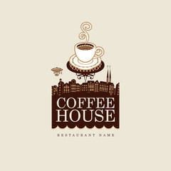 banner for coffee house with cup against the backdrop of the old town