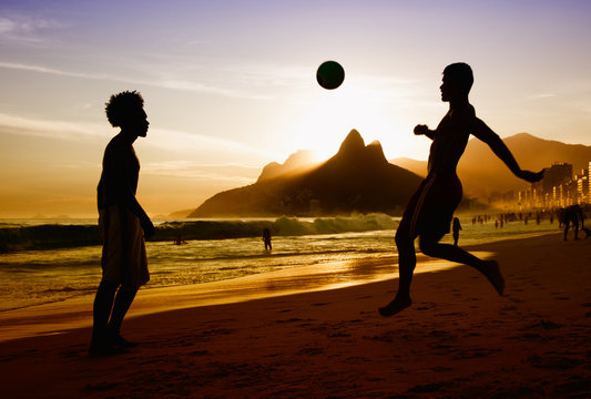 Two soccer players at beach at Rio de Janeiro