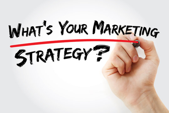 Hand writing What's Your Marketing Strategy with red marker, business concept