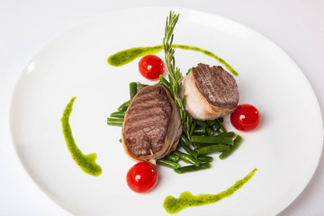 pork medallions on plate