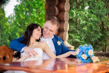 Bride And Groom Enjoying Meal At Wedding Reception