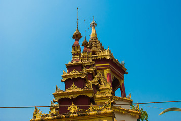 A fragment of the Golden decorative element. Bago. Myanma. Burma.