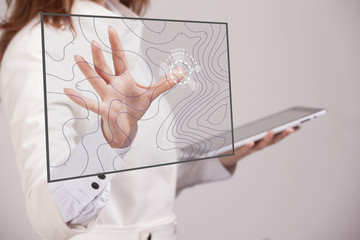 Geographic information systems concept, woman scientist working with futuristic GIS interface on a transparent screen.