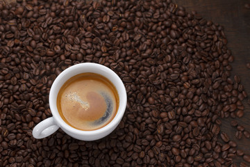 Coffee cup and coffee beans