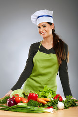 Woman cook with vegetables