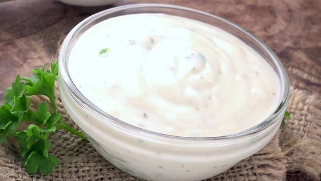 Homemade Garlic Sauce as not loopable rotating 4K footage