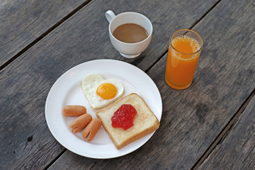 Fototapeta na wymiar breakfast meal orange juice and coffee