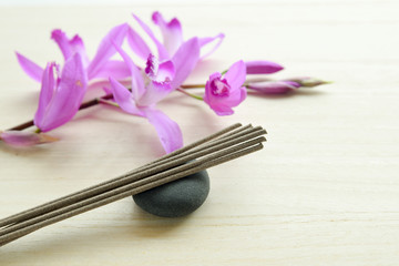 stick incense and orchid