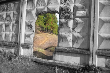 Portal to another world. Hole in an old fence 