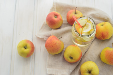 fresh rustic concept, apples on a white rag on the wooden background