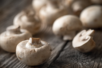 Champignon on the old wooden table horizontal