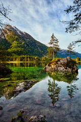 Fototapeta premium turquoise water and scene of trees and Lake