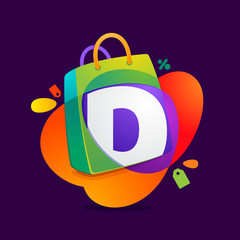 D letter with shopping bag icon and Sale tag.