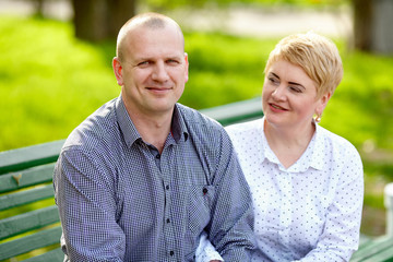 Beautiful mature couple relaxing in the park