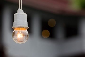 Hanging light bulb in outdoor