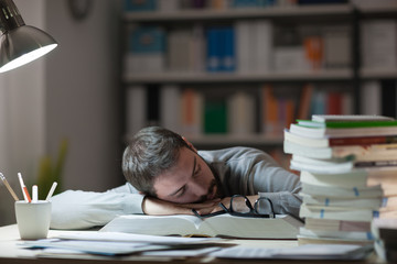 Man sleeping at his desk