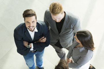 Young people in the office photographed from above