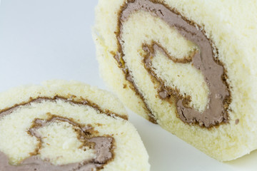 Sliced mocha roll cake