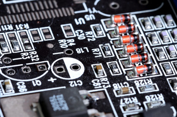 Close-up of inductors, capacitors and chips